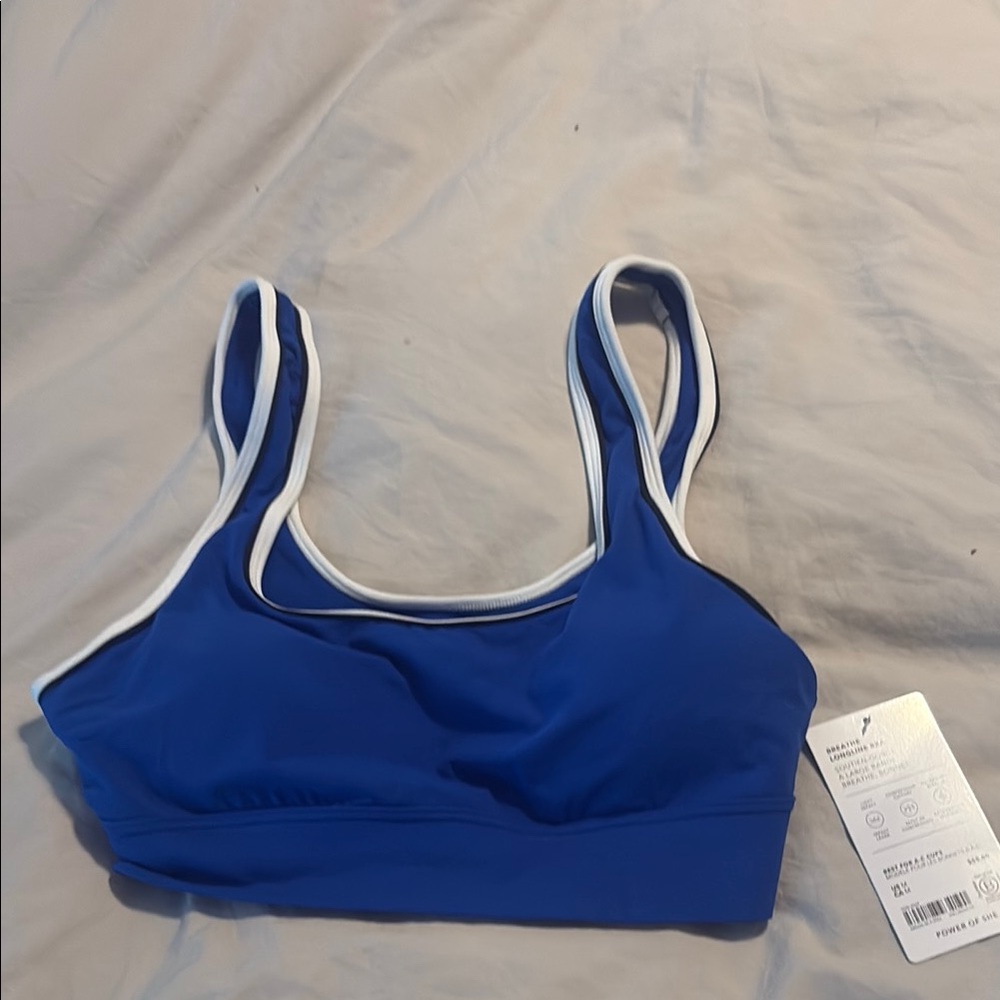 Athleta Blue Sports Bra with White and Black Piping